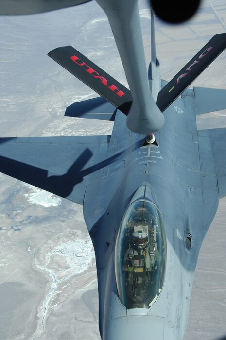 A Utah Air National Guard KC-135 refuels an F-16 from the 419th Fighter Wing over the Utah desert on March 8.  The KC-135 from the 151st Air Refueling Wing refueled seven Utah fighter jets during their training mission.  U.S. Air Force photo by Maj. Krista DeAngelis. (Released)