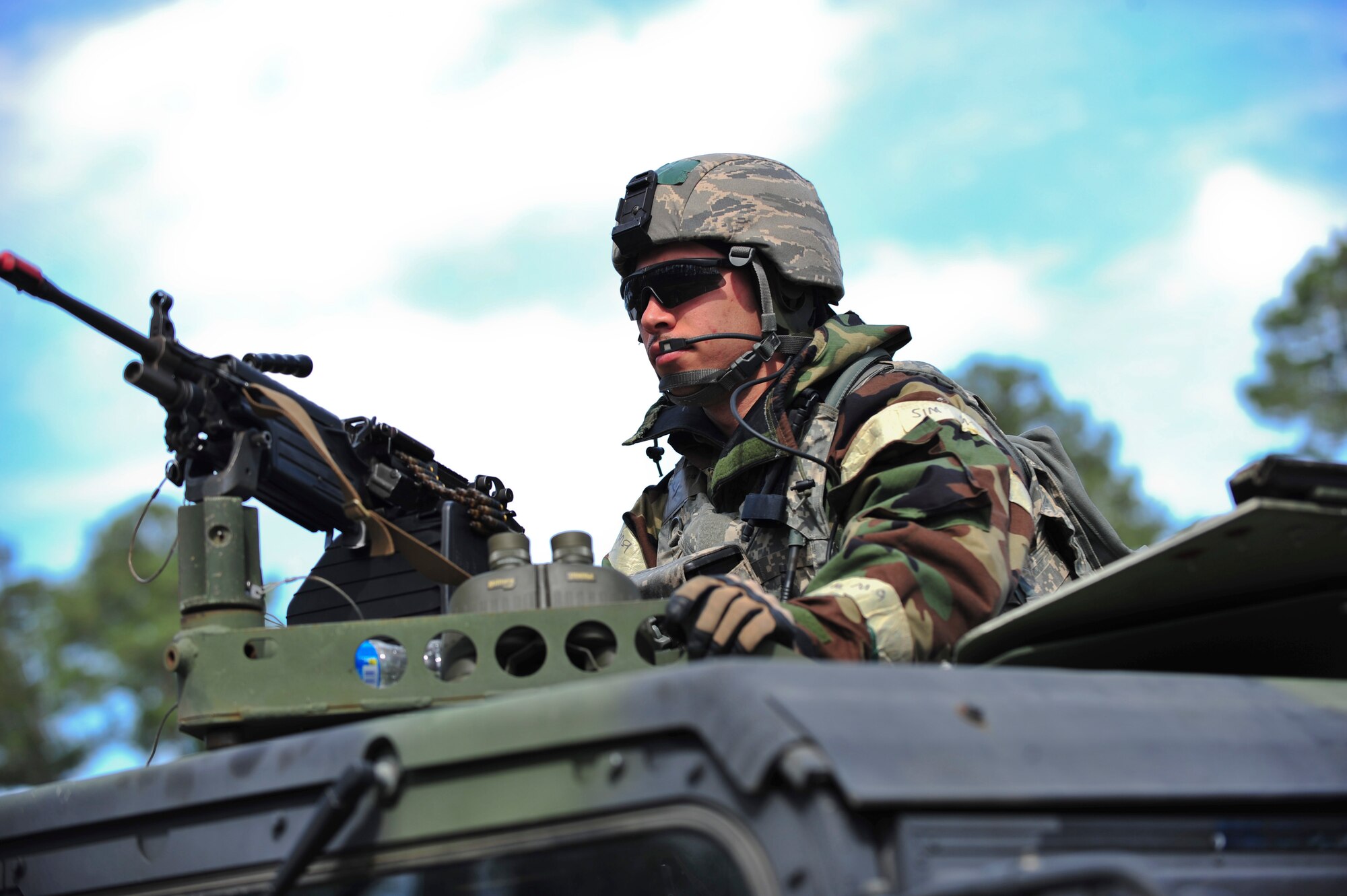 U.S. Air Force Senior Airman Robert Fay, 23d Security Forces Squadron quick reaction force gunner, provides surveillance and security for the base during a phase II operational readiness exercise at Moody Air Force Base, Ga., March 7, 2012. QRF are units capable of responding rapidly to various threats. They have equipment ready to respond to any type of emergency. (U.S. Air Force photo by Staff Sgt. Stephanie Mancha/Released)
