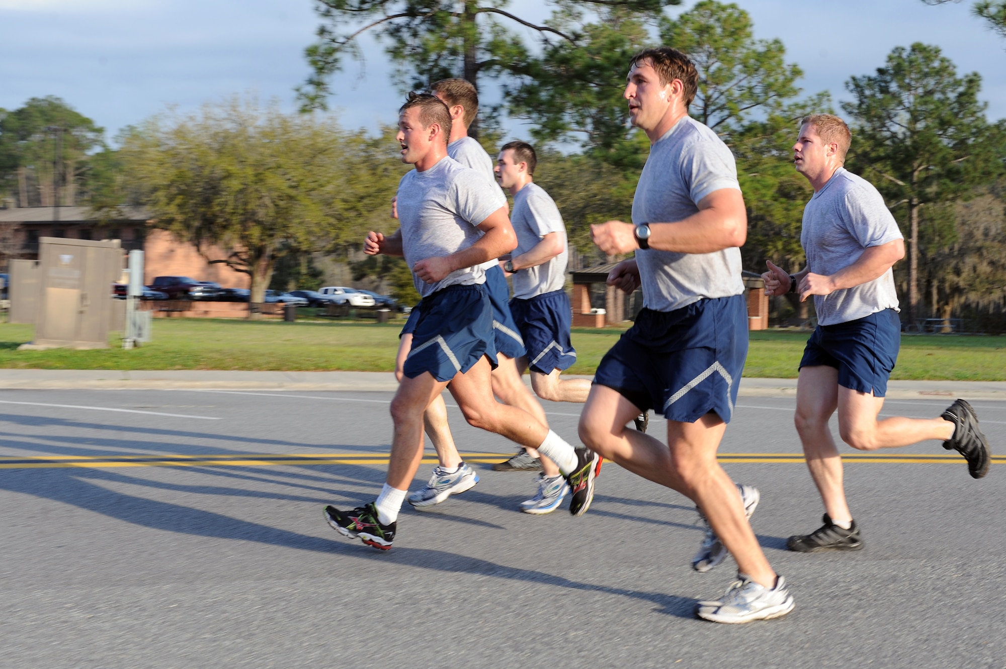 U.S. Air Force Airmen complete a 10K workout in honor of Senior Airman Jason D. Cunningham at Moody Air Force Base, Ga., March 9, 2012. The workout honored the 10-year anniversary of Airman Cunningham's death in Afghanistan. (U.S. Air Force photo by Staff Sgt. Ciara Wymbs/Released)     