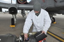 Airman Branden Jewell, 442nd Aircraft Maintenance Squadron/b-flight, inspects his equipment as he prepares to load liquid oxygen onto an A-10 Thunderbolt II on March 4, 2012. The 442nd AMXS is part of the 442nd Fighter Wing, an A-10 reserve unit at Whiteman Air Force Base, Missouri. (U.S.Air Force photo/Senior Airman Wesley Wright)