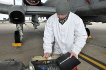 Airman Branden Jewell, 442nd Aircraft Maintenance Squadron/b-flight, inspects his equipment as he prepares to load liquid oxygen onto an A-10 Thunderbolt II on March 4, 2012. The 442nd AMXS is part of the 442nd Fighter Wing, an A-10 reserve unit at Whiteman Air Force Base, Missouri. (U.S.Air Force photo/Senior Airman Wesley Wright)