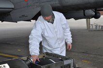 Airman Branden Jewell, 442nd Aircraft Maintenance Squadron/b-flight, inspects his equipment as he prepares to load liquid oxygen onto an A-10 Thunderbolt II on March 4, 2012. The 442nd AMXS is part of the 442nd Fighter Wing, an A-10 reserve unit at Whiteman Air Force Base, Missouri. (U.S.Air Force photo/Senior Airman Wesley Wright)