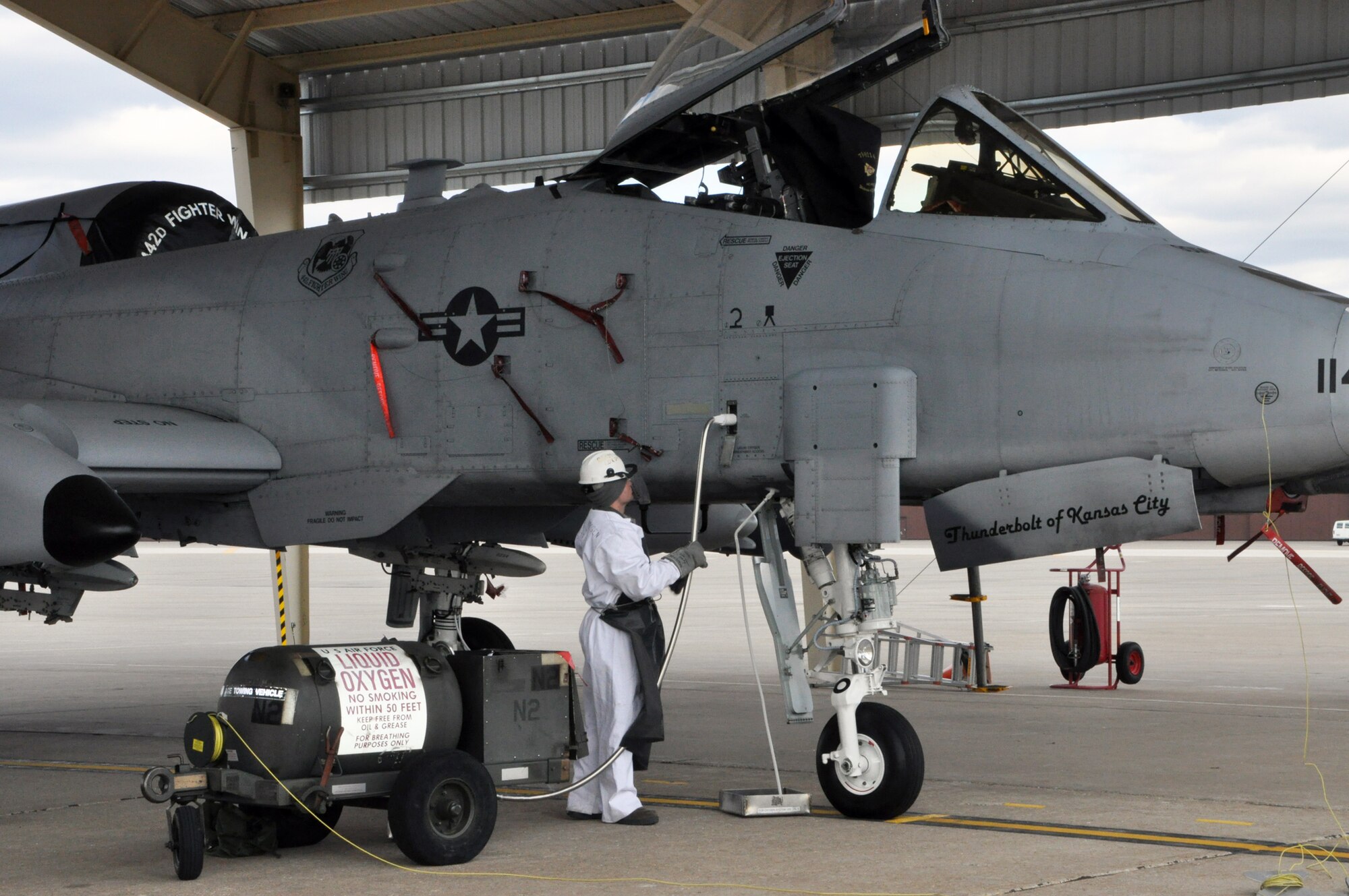 Airman Branden Jewell, 442nd Aircraft Maintenance Squadron/b-flight, loads liquid oxygen onto an A-10 Thunderbolt II on March 4, 2012. The 442nd AMXS is part of the 442nd Fighter Wing, an A-10 reserve unit at Whiteman Air Force Base, Missouri. (U.S.Air Force photo/Senior Airman Wesley Wright)