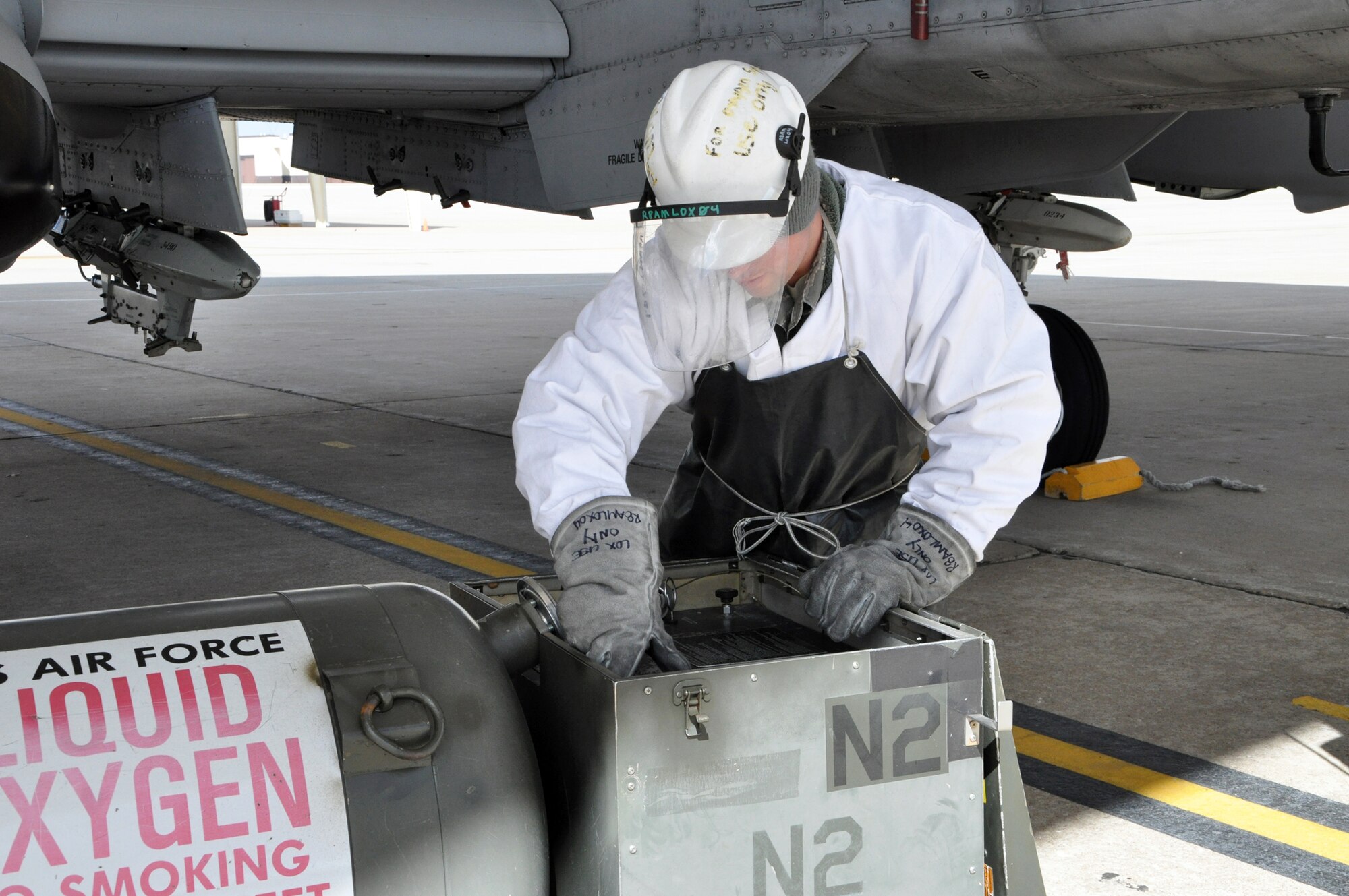 Airman Branden Jewell, 442nd Aircraft Maintenance Squadron/b-flight, prepares to load liquid oxygen to an A-10 Thunderbolt II on March 4, 2012. The 442nd AMXS is part of the 442nd Fighter Wing, an A-10 reserve unit at Whiteman Air Force Base, Missouri. (U.S.Air Force photo/Senior Airman Wesley Wright)