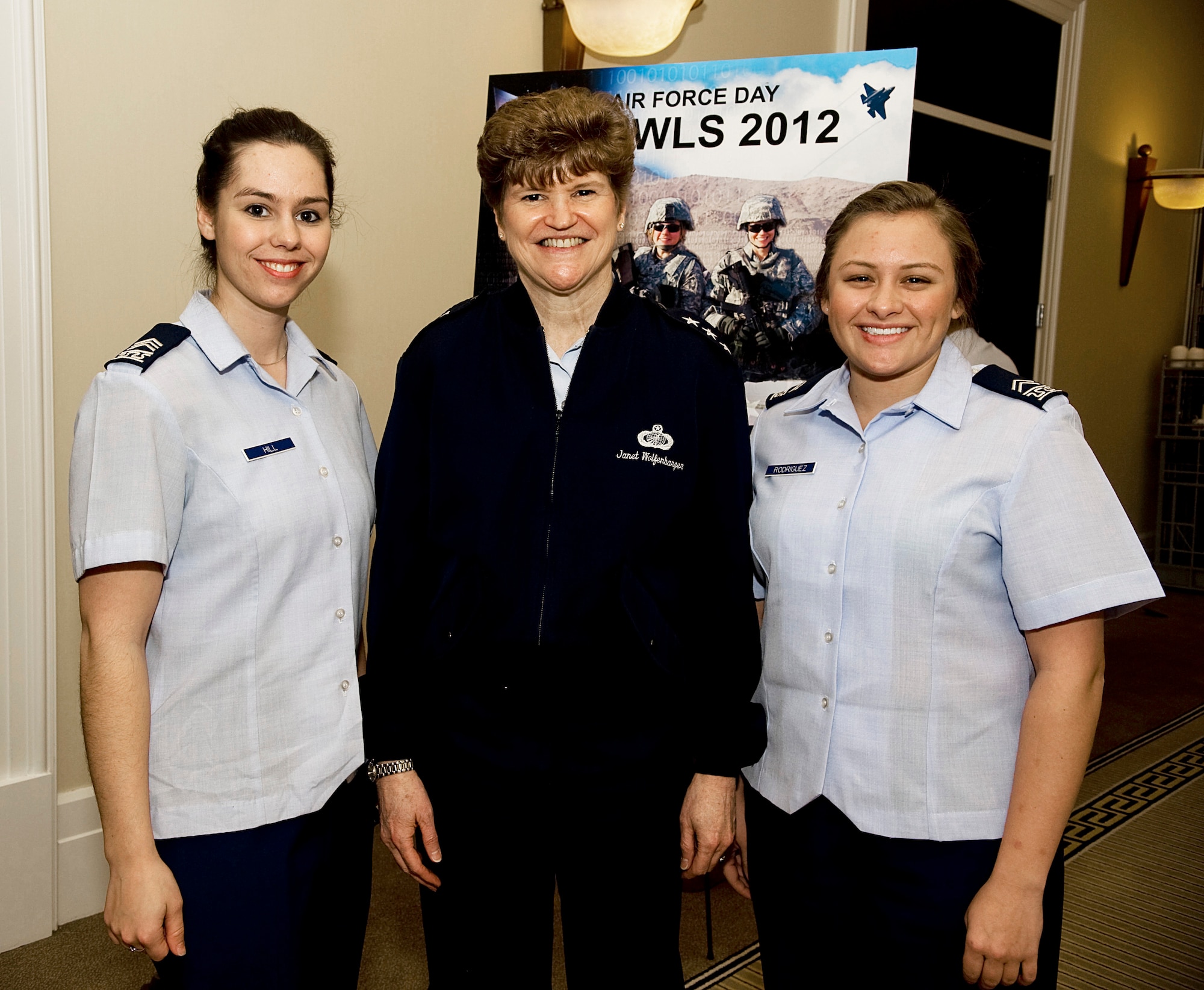 Lt. Gen. Janet Wolfenbarger, center, poses with Cadet's 2nd Class Cassandra Hill, left, and Amanda Rodriguez, during the Joint Women's Leadership Symposium Mar. 6, 2012, at the National Harbor in Washington, D.C. Lt. Gen. Wolfenbarger was recently nominated by the president for promotion to general. This event offered more than 1,700 women from all Service branches the opportunity to focus on professional and leadership development. (U.S. Air Force photo by Master Sgt. Jeanette Spain)