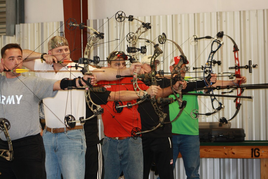 U.S. Army Sgt. Justin Steele (second from left) recently returned to Fort Eustis, Va. from Sumter, S.C., where he participated in an archery qualifier for the upcoming 2012 Warrior Games. Warrior Games is an annual competition for wounded, ill, and injured servicemembers. The event will be held April 30 through May 5 in Colorado Springs, Colo. (Courtesy photo by Nick McCormac/Released)