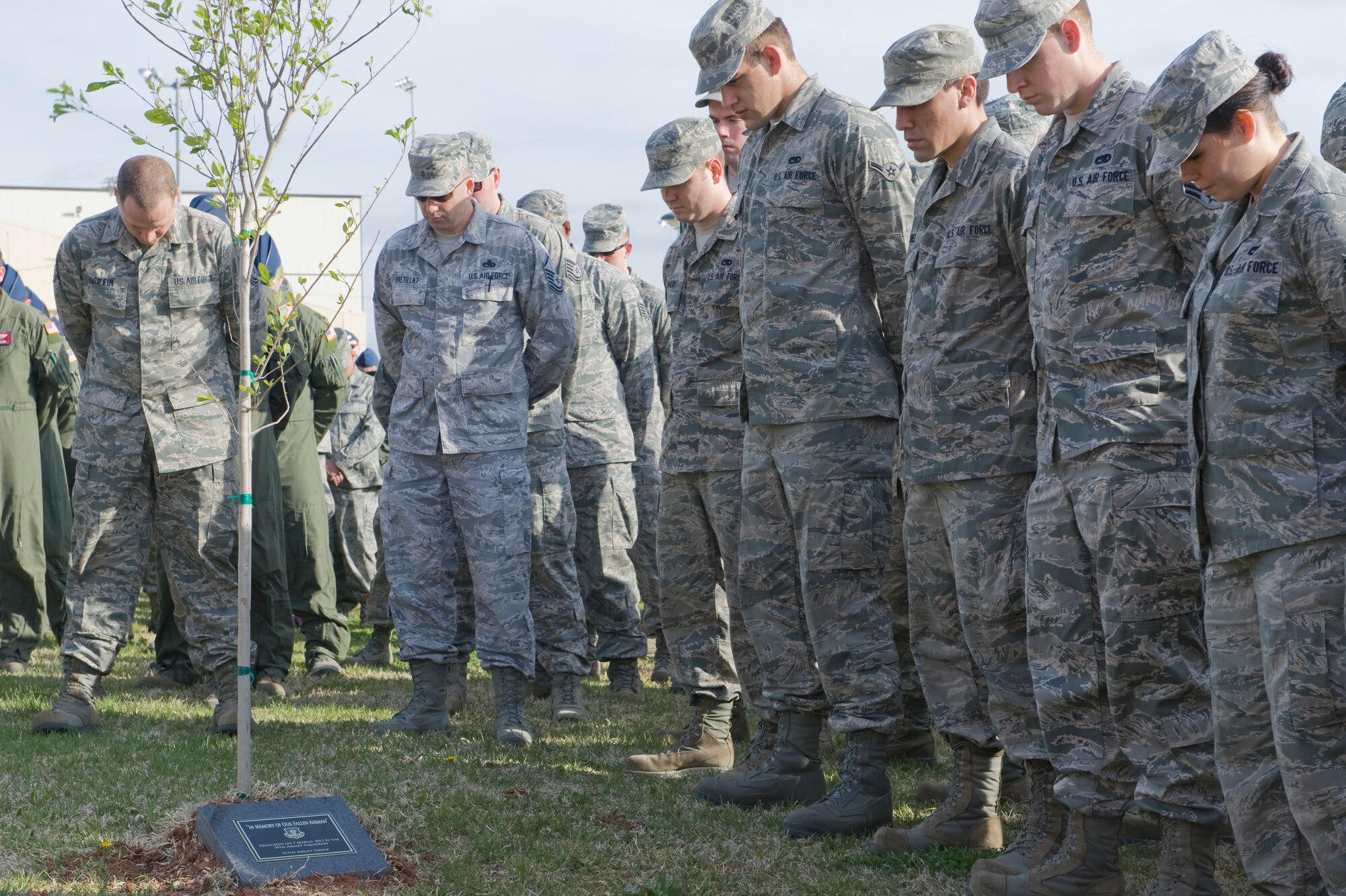 Airmen from the 317th Airlift Group pay tribute during a memorial service March 7, 2012, at Dyess Air Force Base, Texas. The memorial service was held for Tech. Sgt. Link who died of natural causes during a deployment in Southwest Asia. (U.S. Air Force photo by Airman 1st Class Jonathan Stefanko/ Released)
