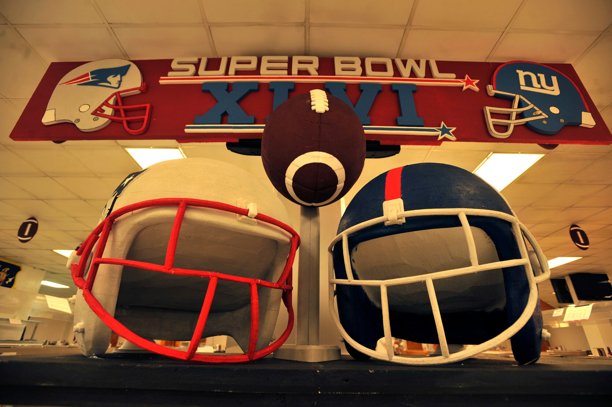 BAGRAM AIRFIELD, Afghanistan— A display made to celebrate the viewing of the Super Bowl stands in the middle of the Dragon Dining Facility at Bagram Airfield, Afghanistan, Feb. 14, 2012. Euigang Jung and Halder Biswajit, decoration designers with Fluor, a service and construction engineering company, design and create all the figurines, signs and ornaments that are on display in the Dragon Dining Facility out of recycled styrofoam. (U.S. Air Force photo/Airman 1st Class Ericka Engblom)