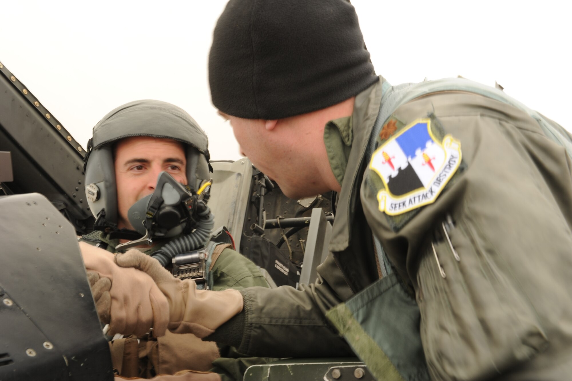 KONYA, Turkey – Staff Sgt. Charles Morris, 52nd Aircraft Maintenance Squadron, left, shakes hands with Maj. Kevin Fisher, 480th Fighter Squadron pilot, before an orientation flight during Anatolian Falcon 2012. The program gives support Airmen a unique opportunity to experience a pilot’s perspective on how the equipment they maintain functions during flight. (U.S. Air Force photo/Staff Sgt. Benjamin Wilson)