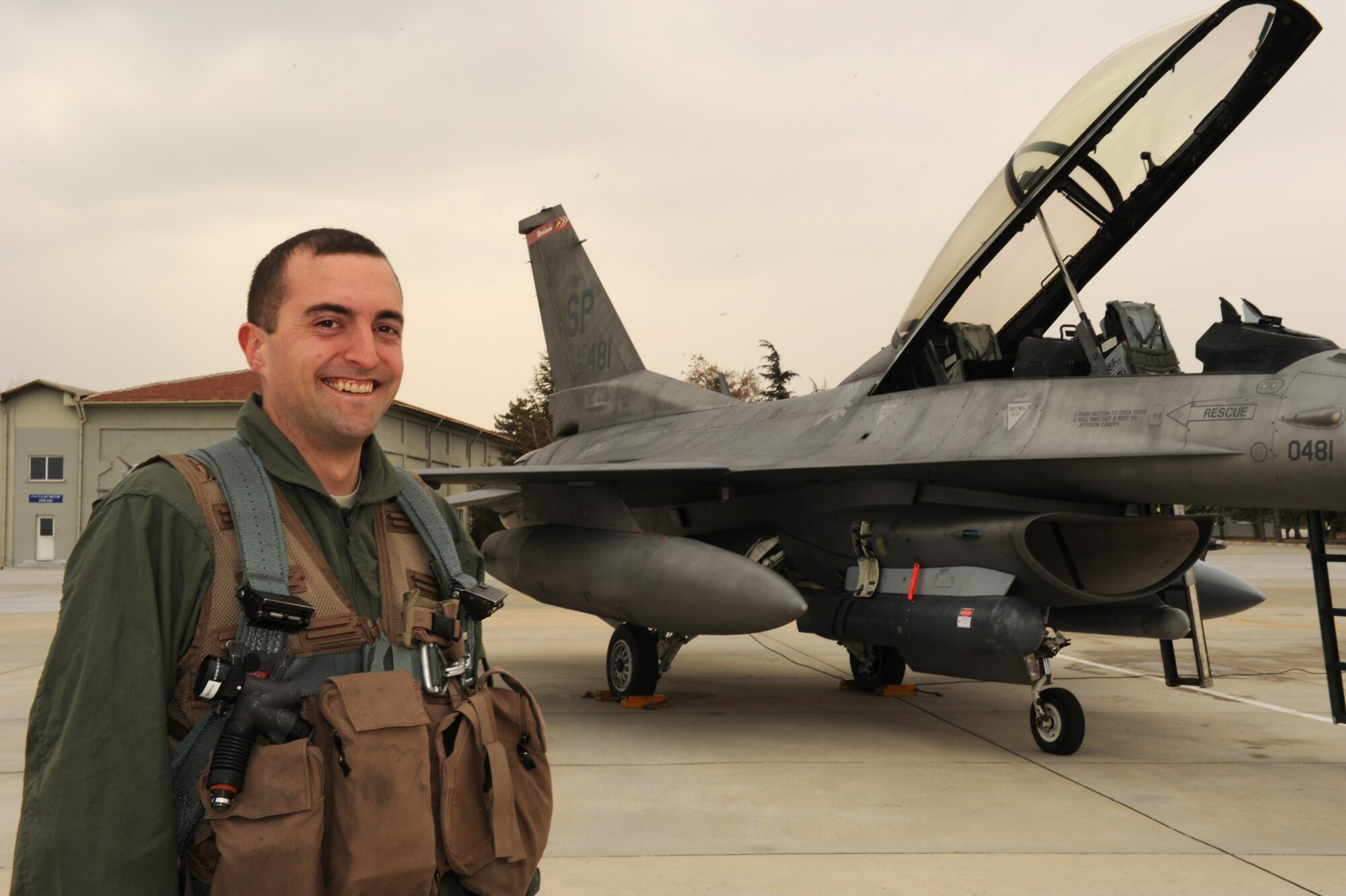KONYA, Turkey – Staff Sgt. Charles Morris, 52nd Aircraft Maintenance Squadron, stands in front of an F-16 Fighting Falcon before an orientation flight during Anatolian Falcon 2012 in Konya, Turkey, March 6. The program gives support Airmen a unique opportunity to experience a pilot’s perspective on how the equipment they maintain functions during flight. (U.S. Air Force photo/Staff Sgt. Benjamin Wilson)