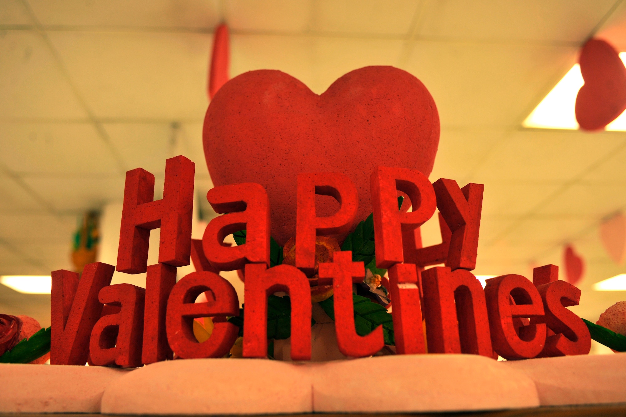 BAGRAM AIRFIELD, Afghanistan—A sculpture made of recycled styrofoam sits on top of the salad bar at Bagram Airfield, Afghanistan, Feb. 14, 2012. Euigang Jung and Halder Biswajit, decoration designers with Fluor, a service and construction engineering company, design and create all the figurines, signs and ornaments that are displayed in the Dragon Dining Facility using recycled styrofoam. (U.S. Air Force photo/Airman 1st Class Ericka Engblom)