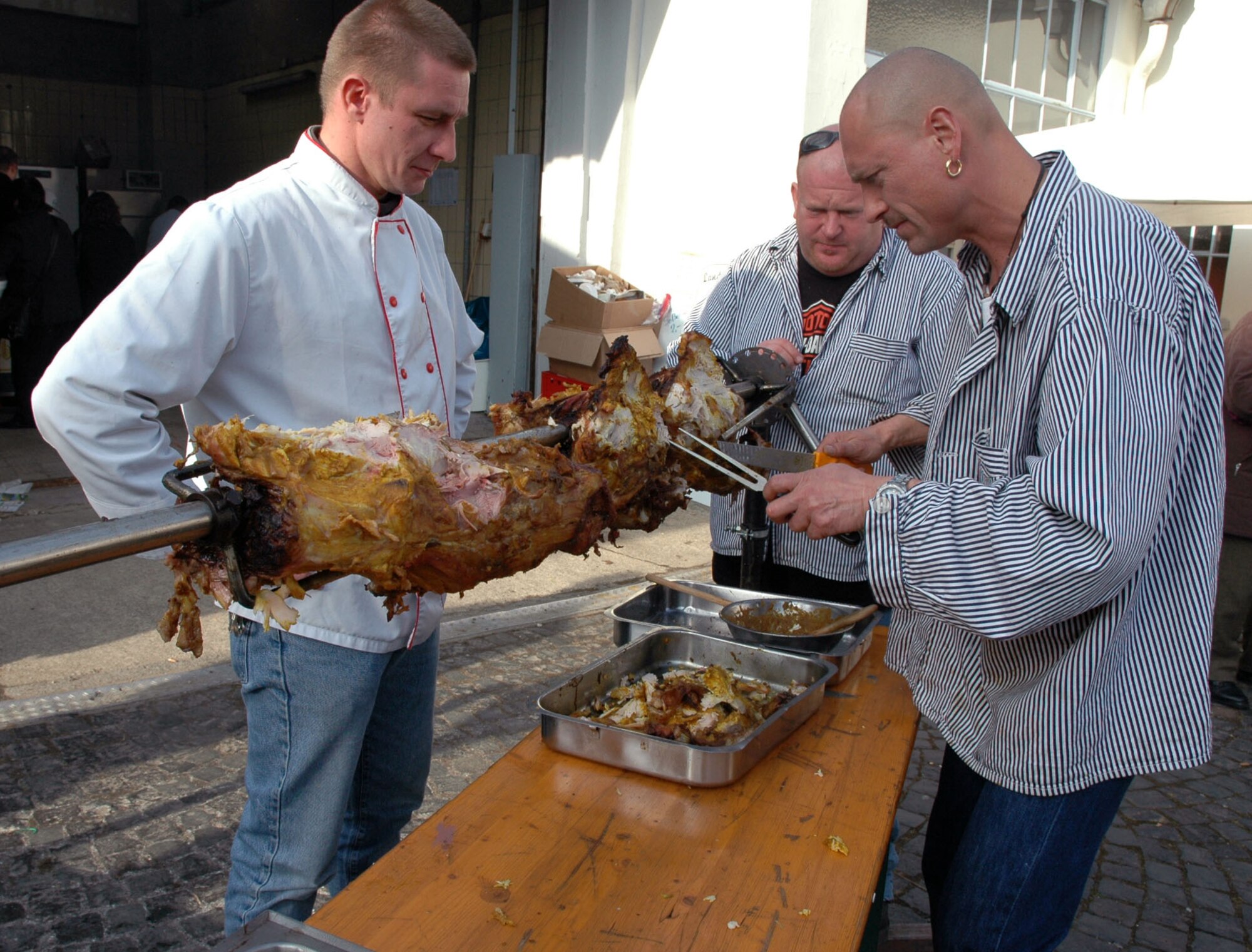 SPANGDAHLEM AIR BASE, Germany — Butchers from the local Bitburg area offered roasted pork meat at a Beda Market event in 2009. Besides tasting traditional food items, visitors can expect to see handicrafts made by local craftsmen, classic vehicles and much more. This year’s event will take place March 16-18. Stores will open from 1-6 p.m. March 18, which is a Sunday.  (U.S. Air Force photo/Iris Reiff/Released)