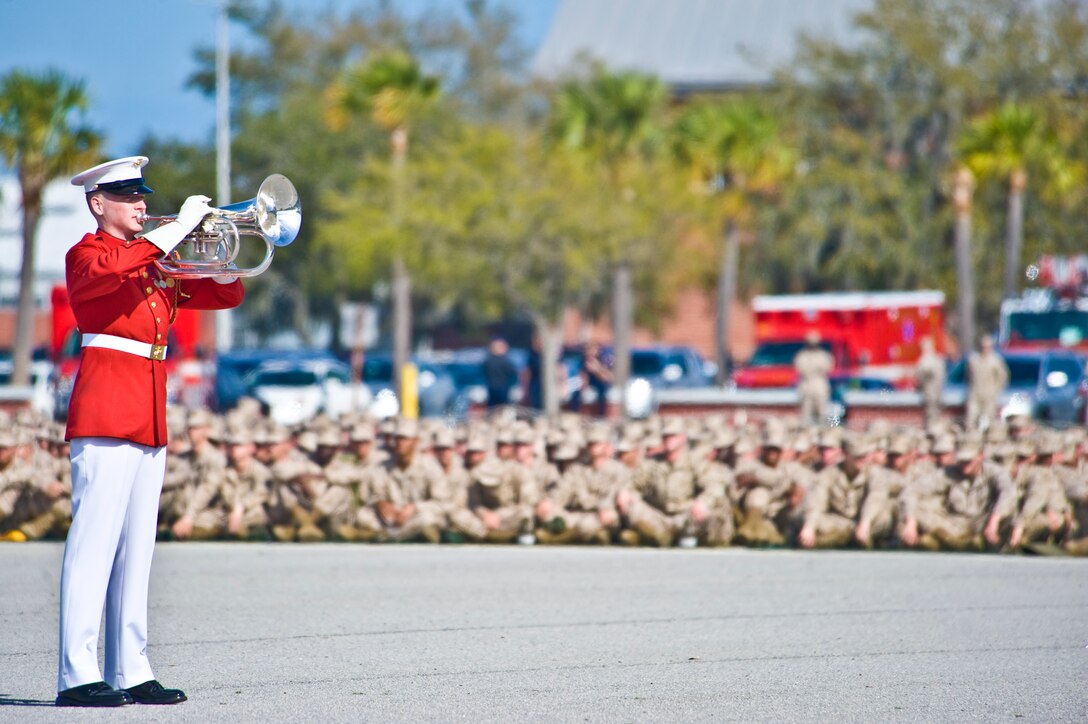 Sgt. Philip Jones, second baritone section leader, performs a solo at the beginning of the Marine Drum & Bugle Corps' musical set during a Battle Color Ceremony at Marine Corps Recruit Depot Parris Island, S.C., March 12, 2012.