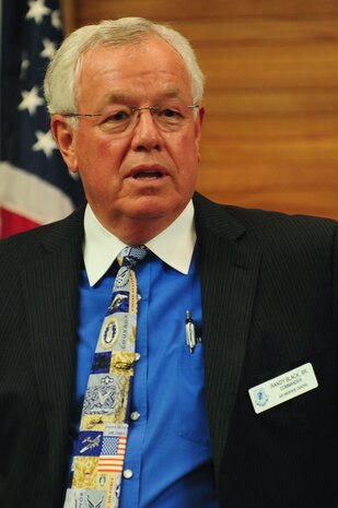 Randy Black, U.S. Air Force Warfare Center honorary commander, speaks to members of the Nellis Support Team and new honorary commanders during a commander's call at Nellis Air Force Base, March 9, 2012.  Mr. Black told stories of how he was able to form partnerships with the Nellis community and highlighted his experiences as an honorary commander.(U.S. Air Force photo by Staff Sgt. William P.Coleman)