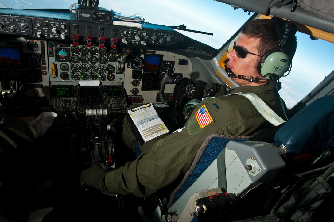 1st Lt. John Fisher, 99th Air Refueling Squadron KC-135 Stratotanker pilot, Alabama Air National Guard communicates with aircraft arriving to refuel during Red Flag 12-3, March 9, 2012 at Nellis Air Force Base, Nev. Red Flag is a realistic air-to-air combat training exercise involving the air forces of the United States and its allies. (U.S. Air Force photo by Senior Airman Brett Clashman)