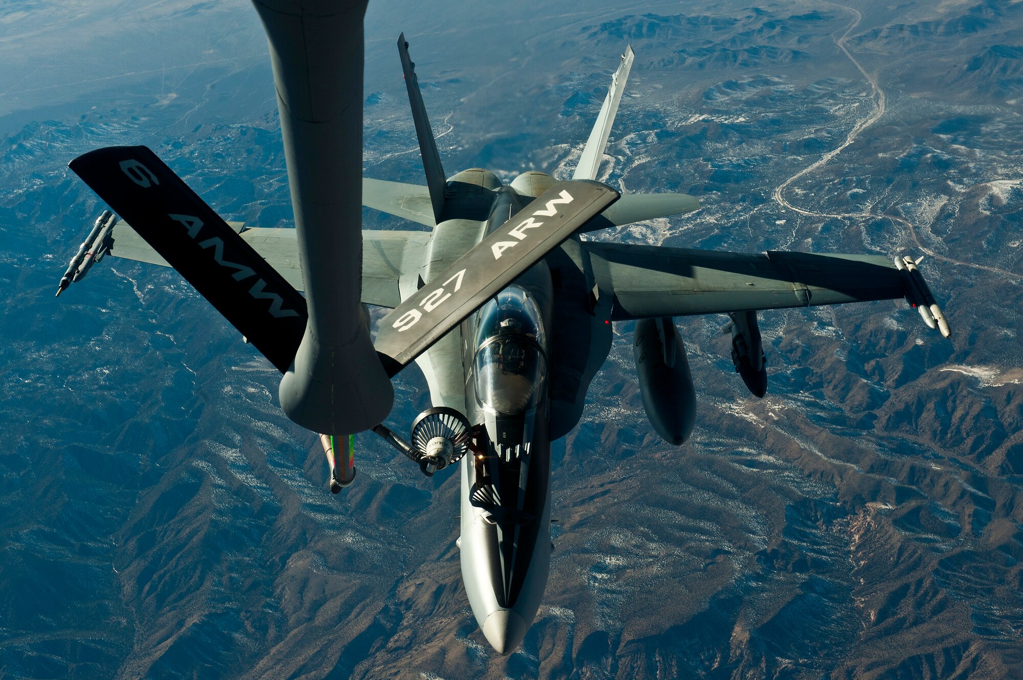 A F/A-18 Hornet, Royal Australian Air Force receives fuel from a KC-135 Stratotanker over the Nevada Test and Training Range during Red Flag 12-3 March 9, 2012 at Nellis Air Force Base, Nev. Members of the RAAF participate in the Red Flag exercise every other year. (U.S. Air Force photo by Senior Airman Brett Clashman)