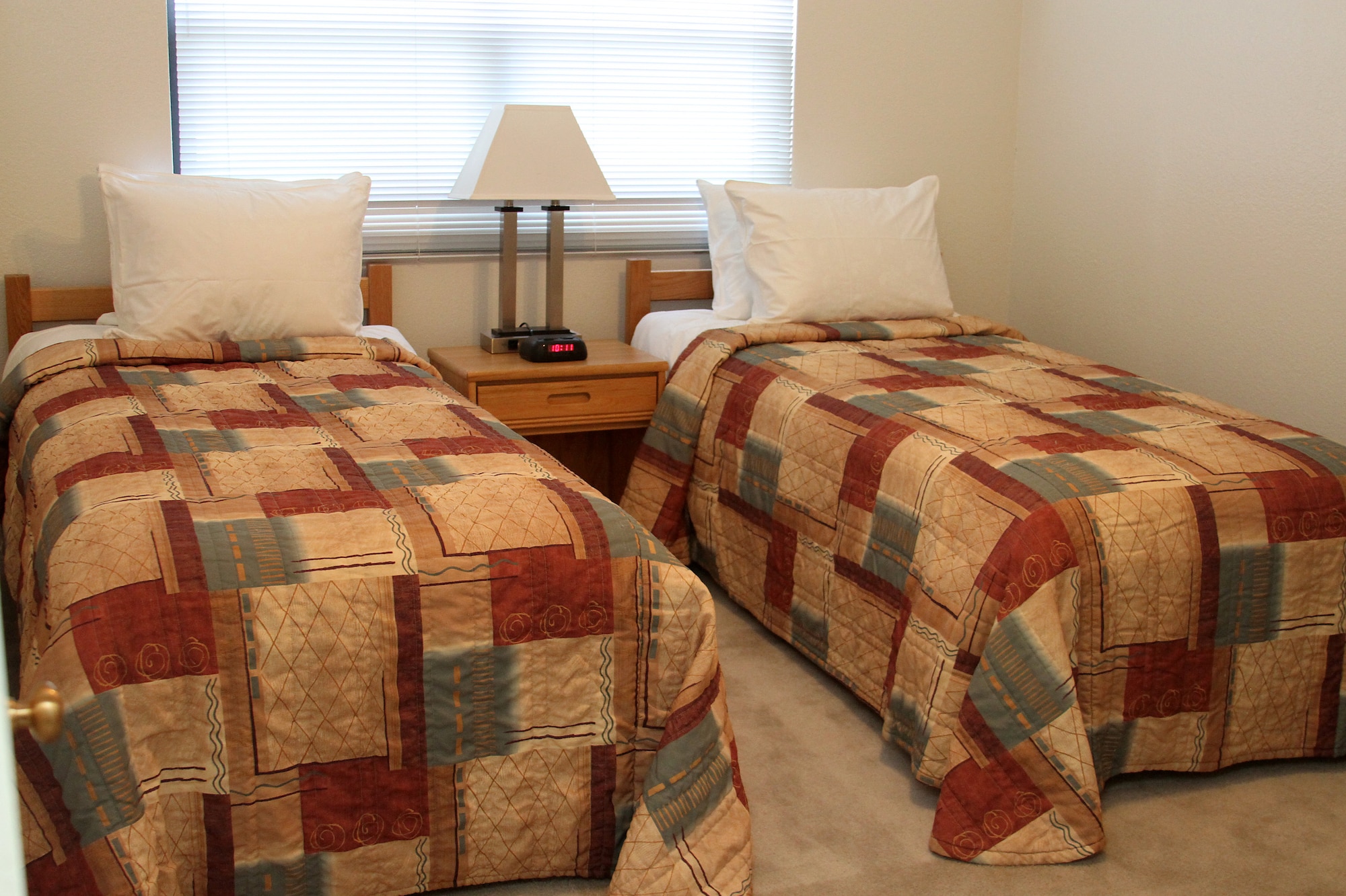 A view of a double bedroom inside a newly renovated Temporary Lodging Facility on Dunning Circle, Nellis Air Force Base, Nev. The 99th Force Support Squadron, 99th Civil Engineering Squadron, and the 99th Communications Squadron pooled existing resources and labor to accomplish renovations. (Courtesy photo)