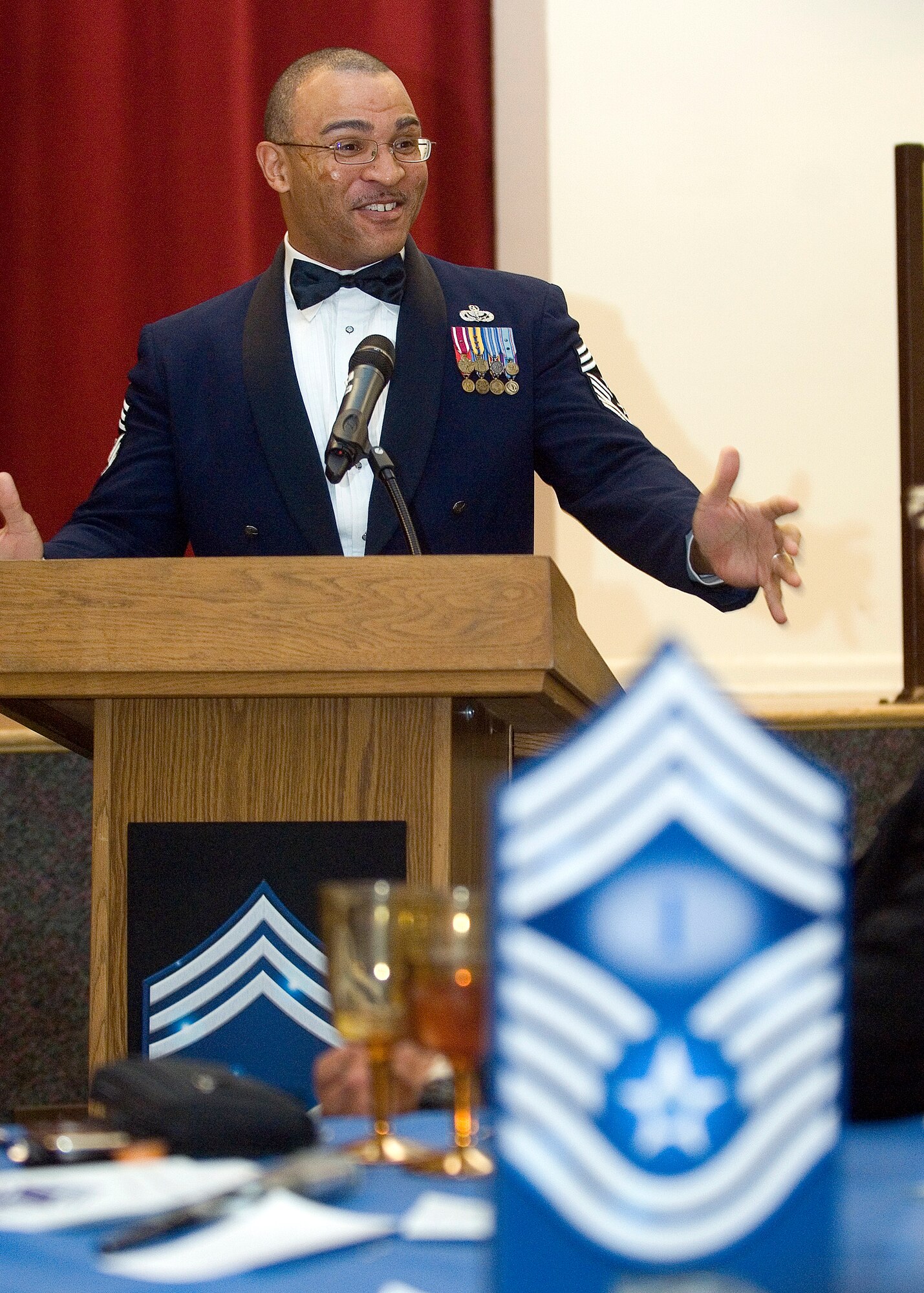 Chief Master Sgt. Lonnie Slater addresses attendees of the Chief Recognition Ceremony March 9 at the Oasis Community Center.  The ceremony and dinner recognized newly promoted and current chiefs. Slater is the Command Chief Master Sergeant for Air University at Maxwell Air Force Base, Ala. Air University provides the full spectrum of Air Force education, graduating 50,000 resident and 120,000 non-resident officers, enlisted, and civilian personnel each year from commissioning programs to the highest levels of professional military education. (Air Force photo by Rob Densmore)