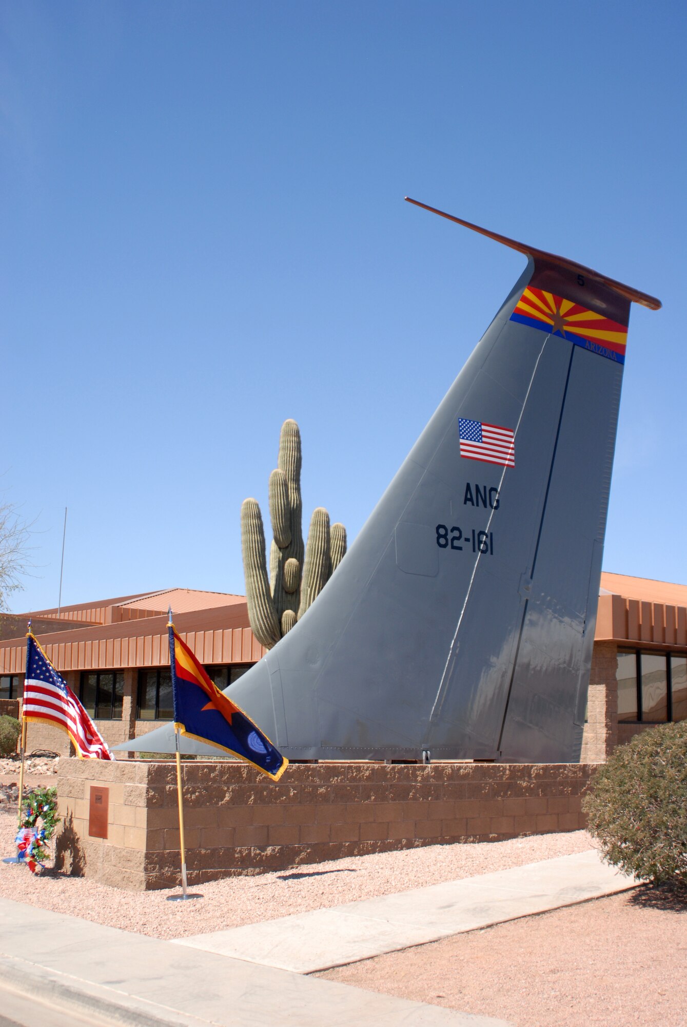 A new memorial featuring a KC-135 Stratotanker tail and plaque was dedicated during a memorial ceremony March 13, 2012, at the 161st Air Refueling Wing, Phoenix. The memorial ceremony marked the 30th anniversary when four 161st Air Refueling Group servicemembers lost their lives while on-duty. (Photo by Master Sgt. Robert Storm/Released)