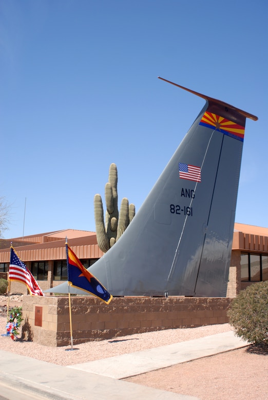 A new memorial featuring a KC-135 Stratotanker tail and plaque was dedicated during a memorial ceremony March 13, 2012, at the 161st Air Refueling Wing, Phoenix. The memorial ceremony marked the 30th anniversary when four 161st Air Refueling Group servicemembers lost their lives while on-duty. (Photo by Master Sgt. Robert Storm/Released)