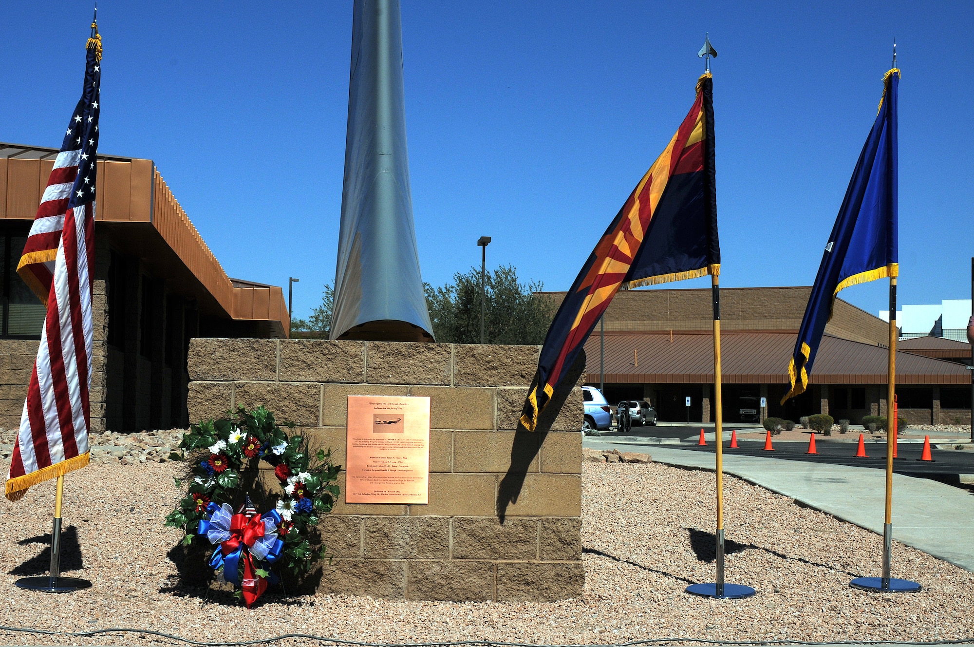 A wreath adorns a new memorial featuring a KC-135 Stratotanker tail and plaque dedicated during a memorial ceremony March 13, 2012, at the 161st Air Refueling Wing, Phoenix. The memorial ceremony marked the 30th anniversary when four 161st Air Refueling Group servicemembers lost their lives while on-duty. (Photo by Staff Sgt. Michael Matkin/Released)