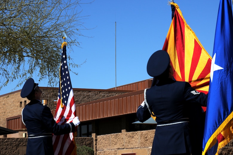 161st Air Refueling Wing honor guard presents the colors during a memorial ceremony dedicating a KC-135 Stratotanker tail and plaque March 13, 2012, at the 161st Air Refueling Wing, Phoenix. The memorial ceremony marked the 30th anniversary when four 161st Air Refueling Group servicemembers lost their lives while on-duty. (Photo by Staff Sgt. Michael Matkin/Released)