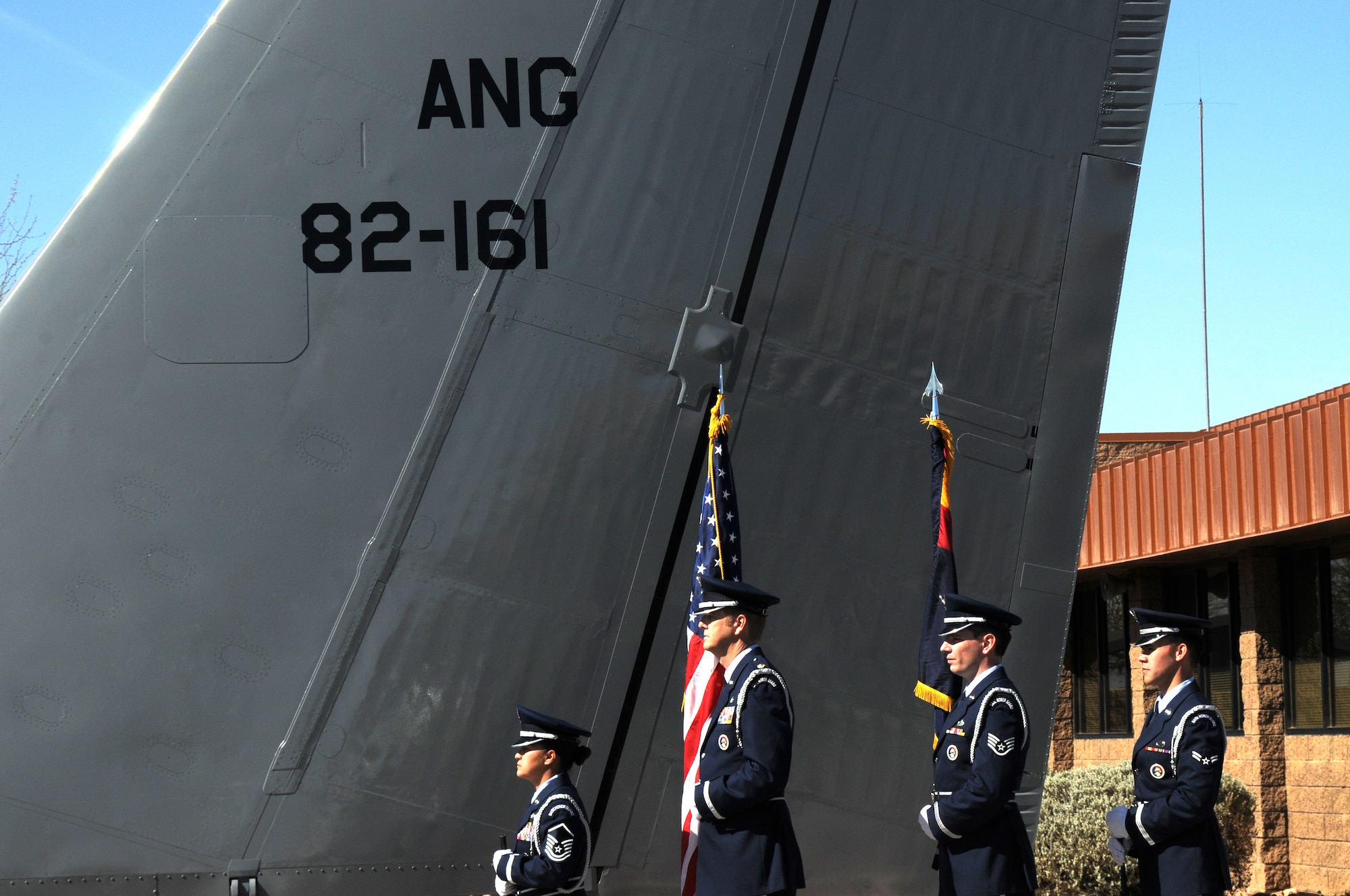 161st Air Refueling Wing honor guard bring in the colors during a memorial ceremony dedicating a KC-135 Stratotanker tail and plaque March 13, 2012, at the 161st Air Refueling Wing, Phoenix. The memorial ceremony marked the 30th anniversary when four 161st Air Refueling Group servicemembers lost their lives while on-duty. (Photo by Staff Sgt. Michael Matkin/Released)