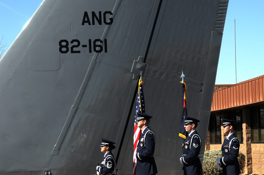 161st Air Refueling Wing honor guard bring in the colors during a memorial ceremony dedicating a KC-135 Stratotanker tail and plaque March 13, 2012, at the 161st Air Refueling Wing, Phoenix. The memorial ceremony marked the 30th anniversary when four 161st Air Refueling Group servicemembers lost their lives while on-duty. (Photo by Staff Sgt. Michael Matkin/Released)