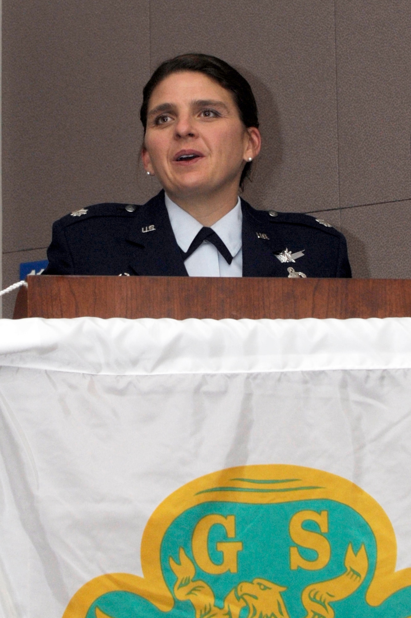 VANDENBERG AIR FORCE BASE, Calif. -- Lt. Col. Heather Yates, 30th Range Management Squadron commander and former girl scout, addresses the Vandenberg Space and Sea Girl Scouts during a ceremony celebrating the 100th Anniversary of the Girl Scouts here, Monday, March 12, 2012. Juliette "Daisy" Gordon Low founded the Girl Scouts March 12, 1912 and believed that all girls should be given the opportunity to develop physically, mentally, and spiritually. (U.S. Air Force photo/Jerry E. Clemens Jr.)