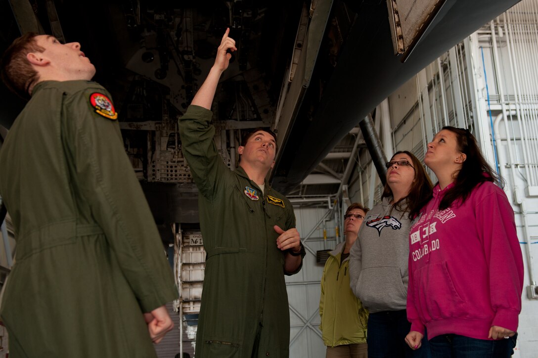 Aircrew of the 37th Bomb Squadron explains a B-1B system to spouses during a Heartlink program at Ellsworth AFB, S.D., March 12, 2012. Heartlink is an orientation program for spouses of Airmen that are new to the base, in which the newcomers are escorted by several commanders’ spouses and given tours of a various locations on base. (U.S. Air Force photo by Airman 1st Class Kate Thornton/Released) 
