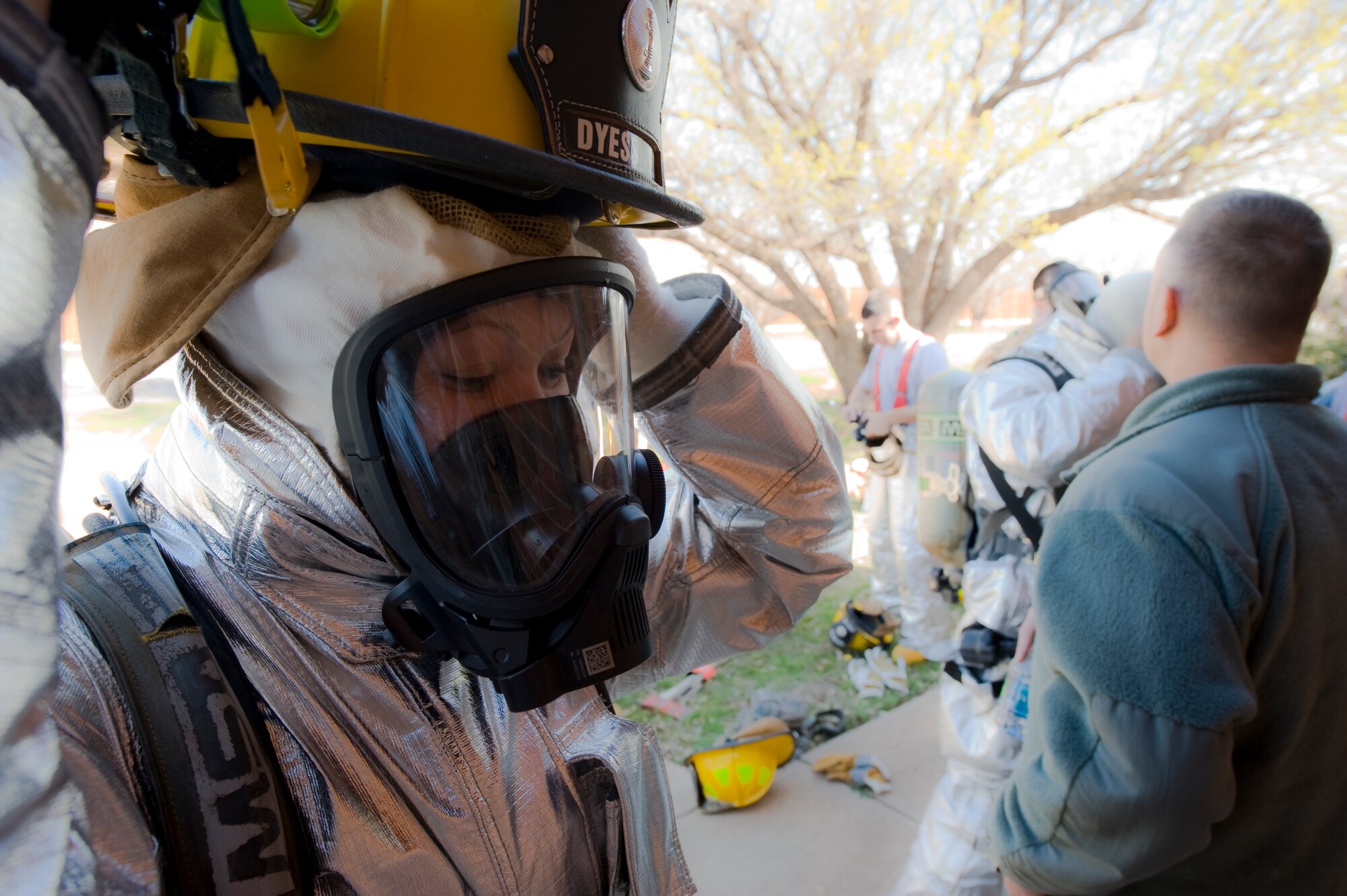 U.S. Air Force Airman 1st Class Avalon Burnham, 7th Civil Engineer Squadron, gets ready for Rapid Intervention Team training Feb. 29, 2012, at Dyess Air Force Base, Texas. During emergencies a RIT is on stand-by in case a fellow firefighter needs evacuation. (U.S. Air Force photo by Airman 1st Class Jonathan Stefanko/ Released)