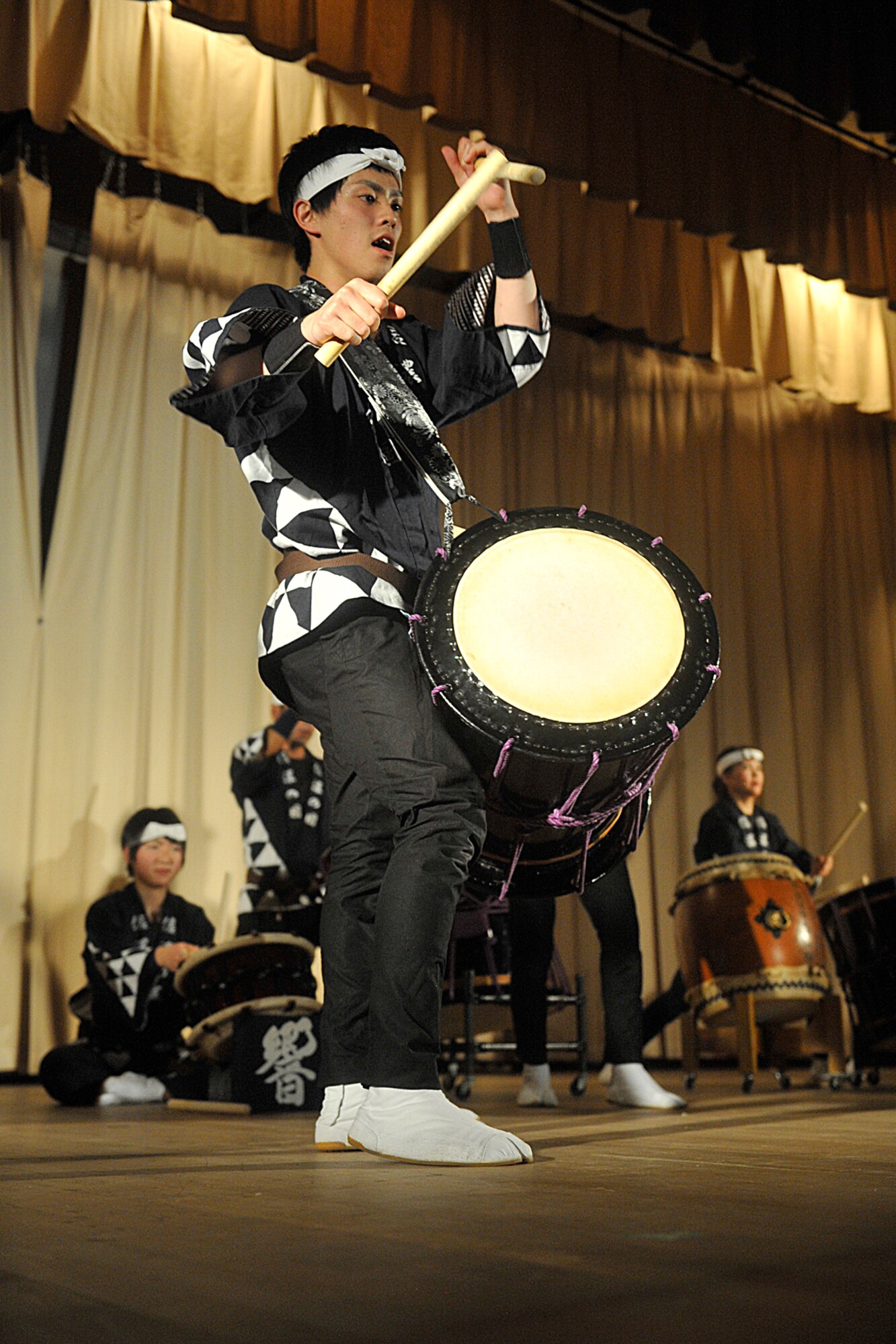 The Kyougaku Taiko Drummers from Japan performed a concert at the Peterson base auditorium on March 11, 2012. The “Arigatou” concert showed Japan’s appreciation for the support the military provided in the wake of the Japan earthquake last year. (U.S. Air Force photo/Rob Lingley)