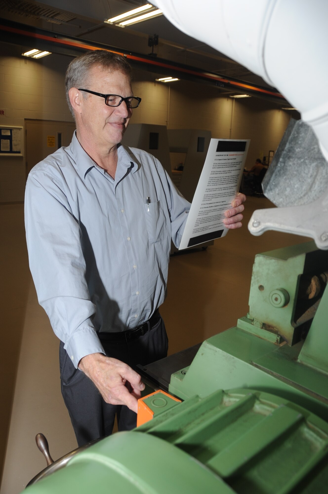 Donald MacMillan, 81st Training Support Squadron, validates Lockout/Tagout procedures to insure safety of personnel prior to equipment maintenance March 13, 2012, at the Trainer Development Facility, Keesler Air Force Base, Miss.  MacMillan was named as a Keesler Outstanding Performer during the Environmental, Safety and Occupational Health Compliance Assessment and Management Program out brief March 9, for his exceptional management of the Lockout/Tagout procedures and conducting quarterly retraining with all Trainer Development personel.  (U.S. Air Force photo by Kemberly Groue)