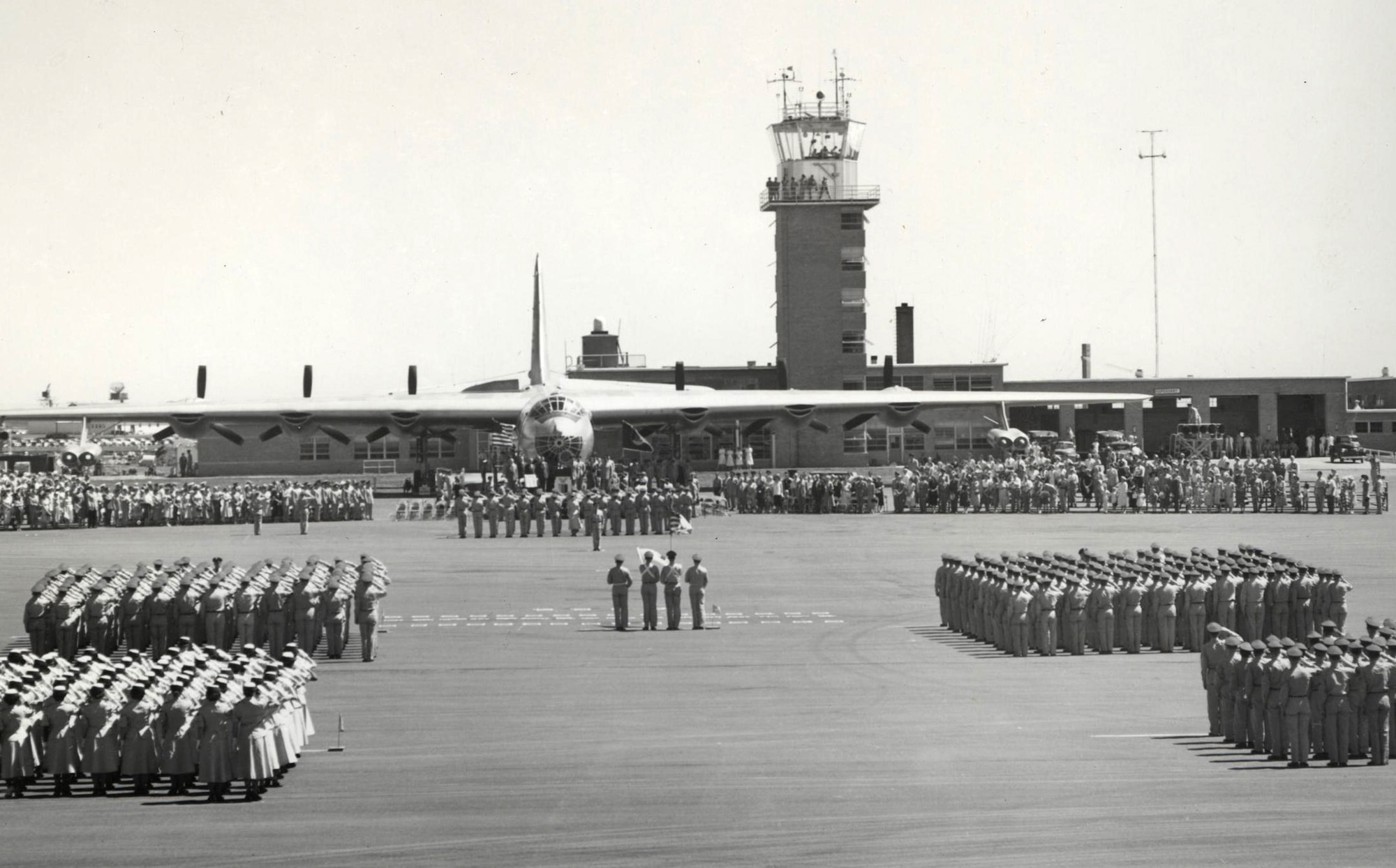 A mass formation of troops presents a final salute in tribute to Brig. Gen. Richard E. Ellsworth during a ceremony renaming the base in their late wing commander’s honor June 13, 1953. (Courtesy photo from South Dakota Air and Space Museum)