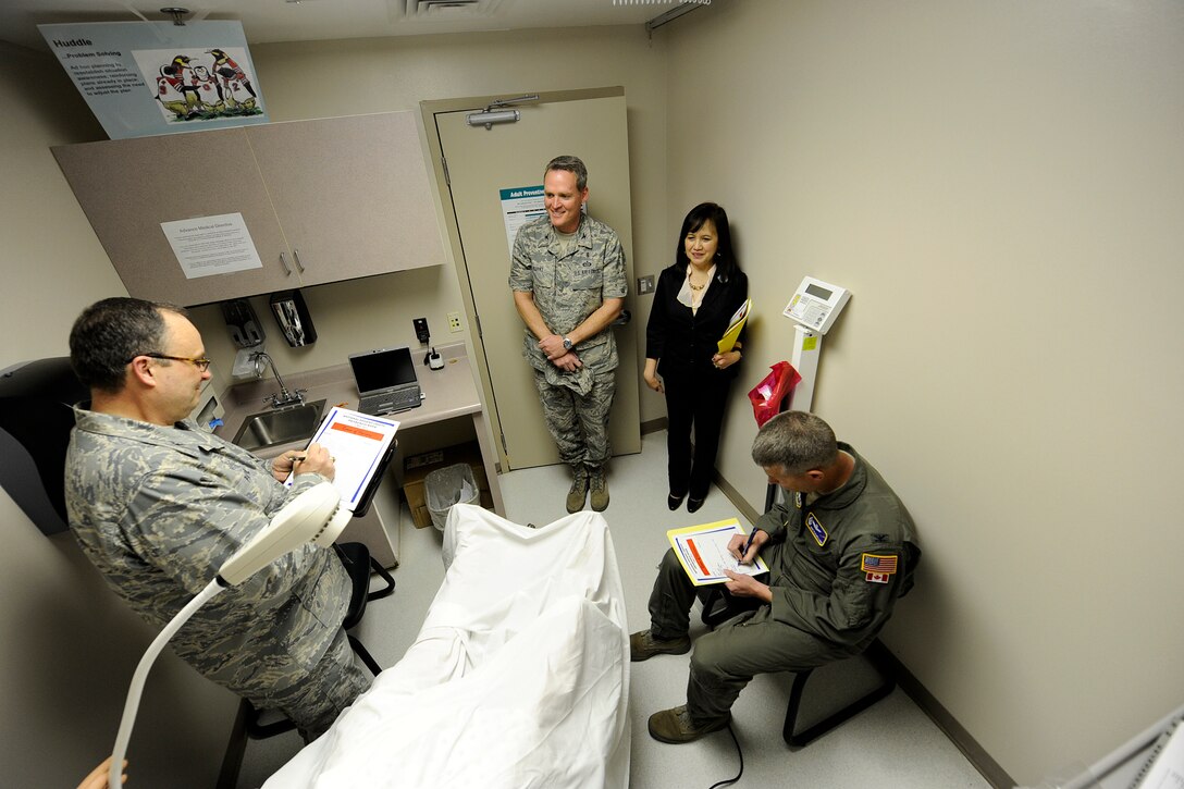 Col. Jeffrey Flewelling (right), 21st Space Wing vice commander, and Col. Lee Payne (left), Air Force Space Command surgeon general, are tested in the 21st Medical Group’s “Room of Horrors,” where they are required to identify as many safety and health improprieties as they possibly can within a set amount of time. The room was part of Patient Safety Week, March 4-10. The theme for this year’s safety week was “Be Aware for Safe Care.” (U.S. Air Force photo/Rob Bussard)