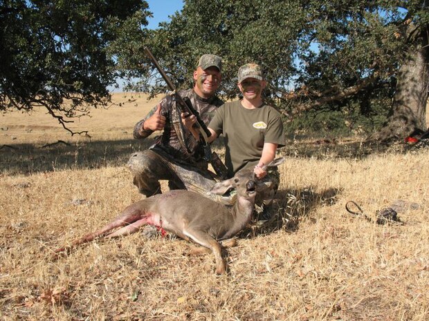 (Left) Master Sgt. Chad Hepner, 9th Medical Group first sergeant, poses with his wife (left) Staff Sgt. Michelle Hepner, 9th Force Support Squadron personnel, after successfully coaching her on her first Beale AFB deer hunt. Hepner tries to bolster the sportsman circle by introducing three or four new people to hunting each year. (U.S. Air Force courtesy photo)