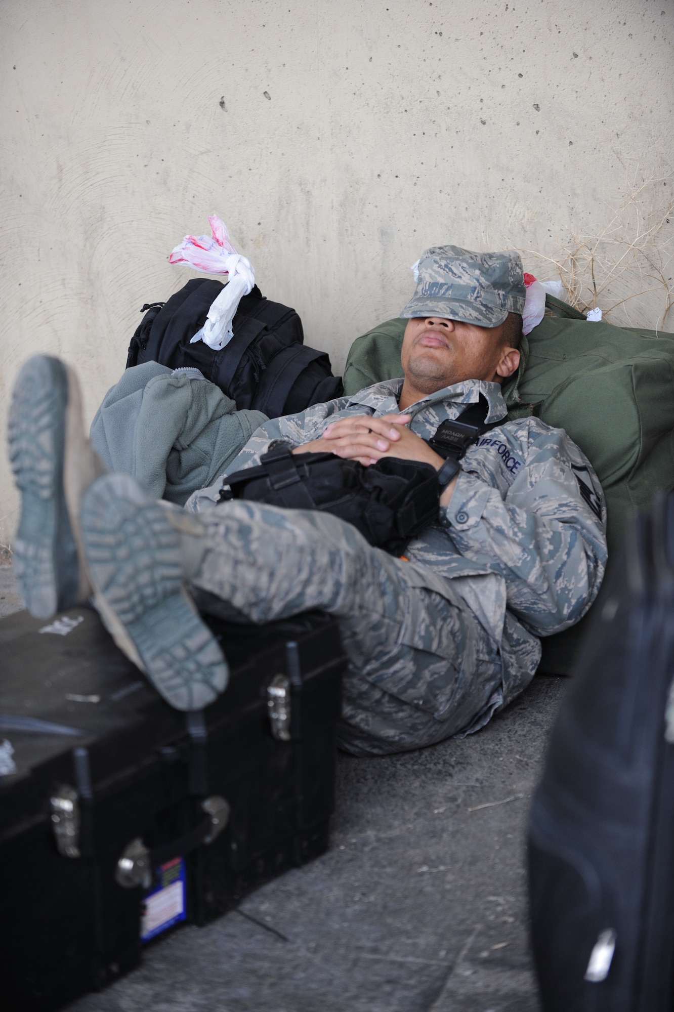 U.S. Air Force Master Sgt. Charles Hooks, 366th Aircraft Maintenance Squadron section chief, rests before his deployment to Southwest Asia in support Operation Enduring Freedom, March 12, 2012, at Mountain Home Air Force Base, Idaho. The Mountain Home Airmen will support F-15E overseas contingency missions designed to deliver combat air power for joint operations to meet combatant commander requirements. (U.S. Air Force photo/ Airman 1st Class Jonathan Glanville/ Released)