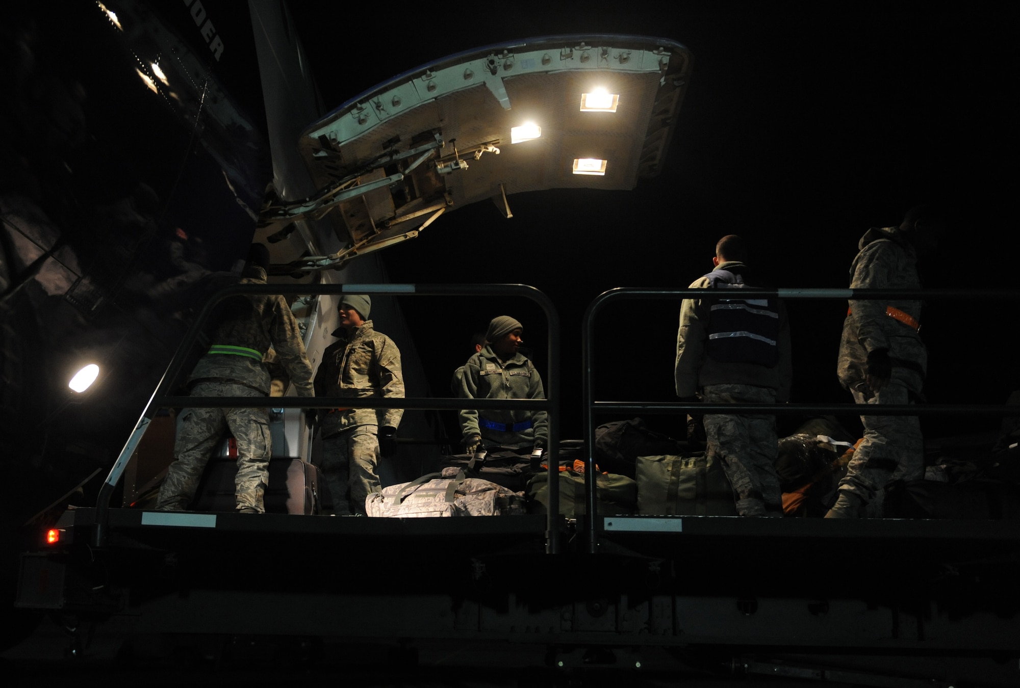 Airmen assigned to baggage detail load mobility bags onto a Boeing 767 before members of the 391st Fighter Squadron depart for deployment March 12, 2012, at Mountain Home Air Force Base, Idaho, in support of Operation Enduring Freedom. The Bold Tigers have conducted several months of training in preparation for this mission. (U.S. Air Force photo/Senior Airman Debbie Lockhart)