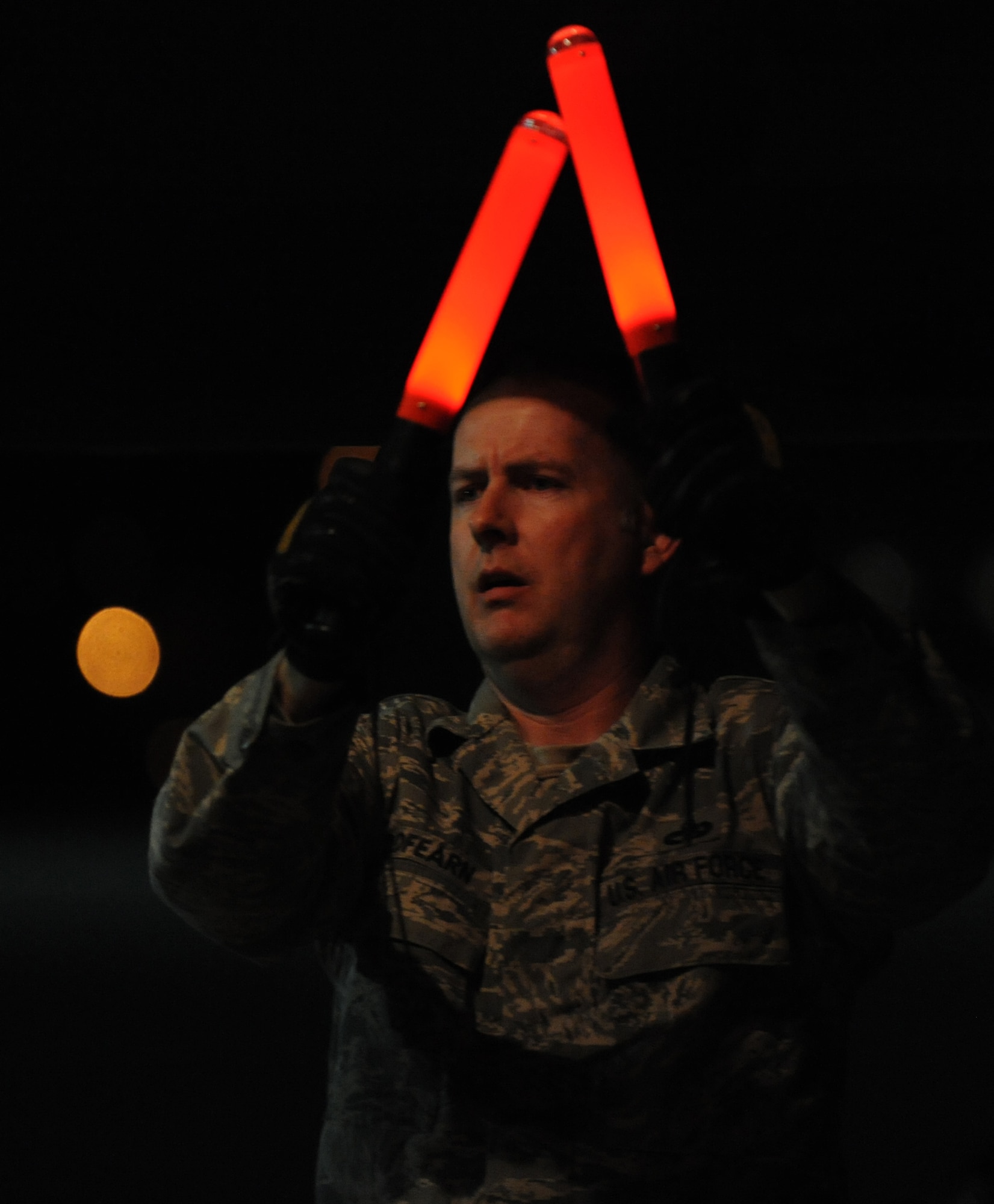 U.S. Air Force Master Sgt. Aaron Redfearn, 366th Logistics Readiness Squadron, guides a K-loader up to an aircraft in order to load bags before personnel leave for a deployment March 12, 2012, at Mountain Home Air Force Base, Idaho. "The Gunfighter team trains around the clock to ensure they are ready to serve our nation’s call,” said Col. Ron Buckley, 366th Fighter Wing commander. (U.S. Air Force photo/Senior Airman Debbie Lockhart)