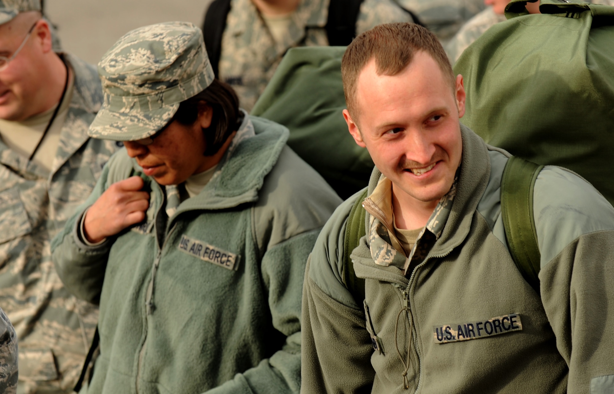 An Airman tasked to deploy with the 391st Fighter Squadron waits in line to drop off his deployment gear with the baggage detail before leaving March 12, 2012, at Mountain Home Air Force Base, Idaho, for a deployment. The 391st Fighter Squadron "Bold Tigers" will potentially conduct combat operations throughout their deployment.  (U.S. Air Force photo/Senior Airman Debbie Lockhart)