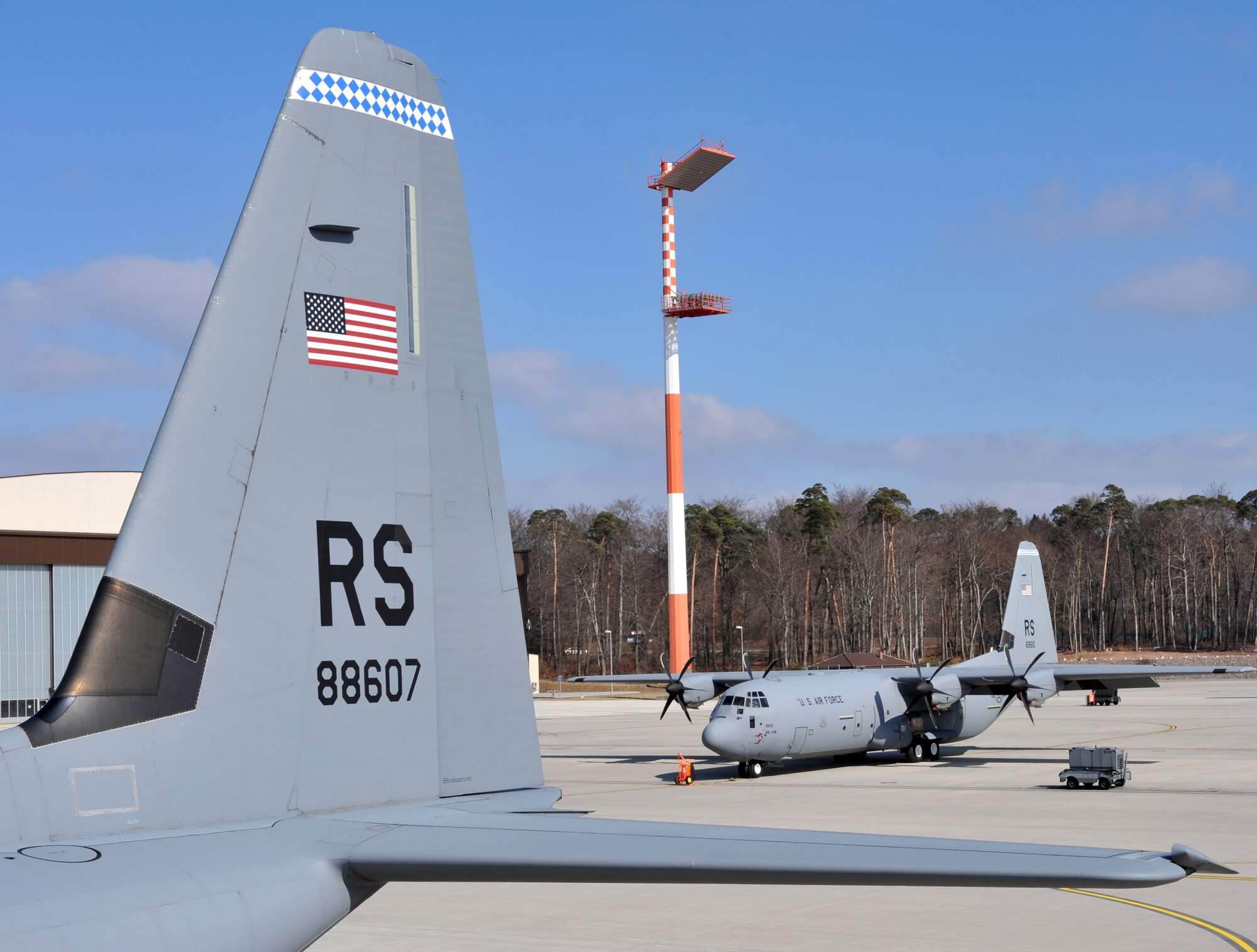 Two C-130J Super Hercules aircraft await pre-flight inspection and preventative maintenance, Ramstein Air Base, Germany, March 12, 2012. The C-130J provides efficient and reliable combat delivery, air-to-air refueling, special operations, disaster relief and humanitarian missions as part of revitalizing the Air Force fleet. (U.S. Air Force photo/Airman 1st Class Caitlin O'Neil-McKeown)