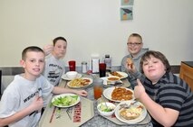 Students from Central-Hardin Middle School, Hardin, Mo., toured Whiteman Air Force Base, March 12, 2012. The tour was organized by Wright Flight, a non-profit organization designed to motivate students to achieve academically through incentive tours and flights. The students were briefed on the 442nd Fighter Wing mission by Col. Gregory Eckfeld. They were also shown the Oscar 1 missile silo by Staff Sgt. Steven Bussey and ate at the Ozark Inn dining facility. The 442nd Fighter Wing is an A-10 Thunderbolt II Air Force Reserve unit at Whiteman Air Force Base, Mo. (U.S. Air Force photo/Senior Airman Wesley Wright)