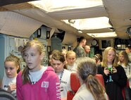 Students from Central-Hardin Middle School, Hardin, Mo., toured Whiteman Air Force Base March 12, 2012. The tour was organized by Wright Flight, a non-profit organization designed to motivate students to achieve academically through incentive tours and flights. The students were briefed on the 442nd Fighter Wing mission by Col. Gregory Eckfeld. They were also shown the Oscar 1 missile silo by Staff Sgt. Steven Bussey and ate at the Ozark Inn dining facility. The 442nd Fighter Wing is an A-10 Thunderbolt II Air Force Reserve unit at Whiteman Air Force Base, Mo. (U.S. Air Force photo/Senior Airman Wesley Wright)