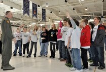 Students from Central-Hardin Middle School, Hardin, Mo., toured Whiteman Air Force Base, March 12, 2012. The tour was organized by Wright Flight, a non-profit organization designed to motivate students to achieve academically through incentive tours and flights. The students were briefed on the 442nd Fighter Wing mission by Col. Gregory Eckfeld. They were also shown the Oscar 1 missile silo by Staff Sgt. Steven Bussey and ate at the Ozark Inn dining facility. The 442nd Fighter Wing is an A-10 Thunderbolt II Air Force Reserve unit at Whiteman Air Force Base, Mo. (U.S. Air Force photo/Senior Airman Wesley Wright)