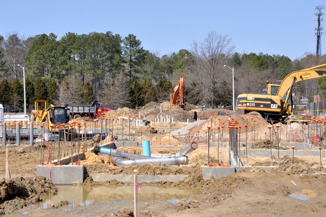 Workers of the Ritchie-Curbow construction company begin building a new shoppette on the corner of Jefferson Avenue and Washington Boulevard at Fort Eustis, Va., Mar. 6, 2012. The projected completion time frame of the shoppette is the middle of August, which is supposed to provide a bigger gas station with more gas pumps and a Sub Way restaurant. (U.S. Army photo by Sgt. Hilton Hunter/Released)