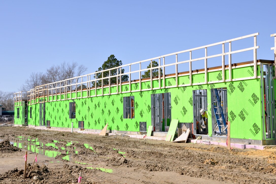 New barracks for Soldiers in the Warrior Transition Unit await completion at the corner of 25th and Sternberg avenues, at Fort Eustis, Va., Mar. 6, 2012. Ft. Eustis plans to open the four-floor tall, 40-room building sometime in December. (U.S. Army photo by Sgt. Hilton Hunter/Released)