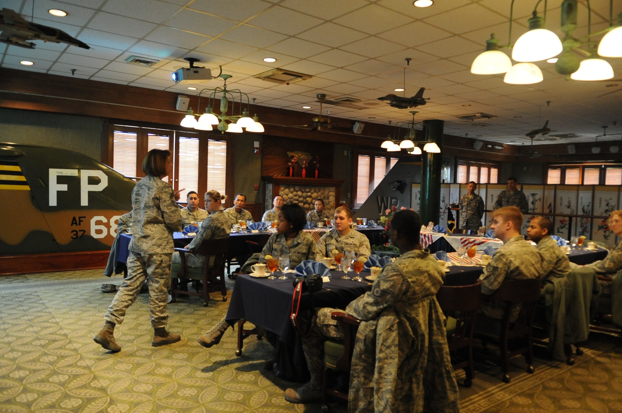 Chief Master Sgt. Carolyn Regan, dental services career field manager, talks to 8th Medical Group dental flight Airmen during a visit March 9, 2012, to Kunsan Air Base, Republic of Korea. One notable change in the dental career field is vectoring, meaning master sergeants and above are specifically chosen for the jobs they can best fill. (U.S. Air Force photo by Senior Airman Brigitte N. Brantley/Released)