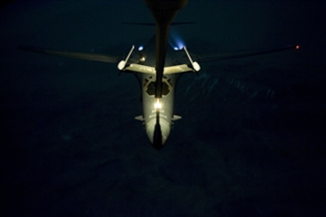 A U.S. Air Force B-1 Lancer aircraft receives fuel from a KC-10 Extender aircraft assigned to the 908th Expeditionary Air Refueling Squadron over Afghanistan on March 4, 2012.  