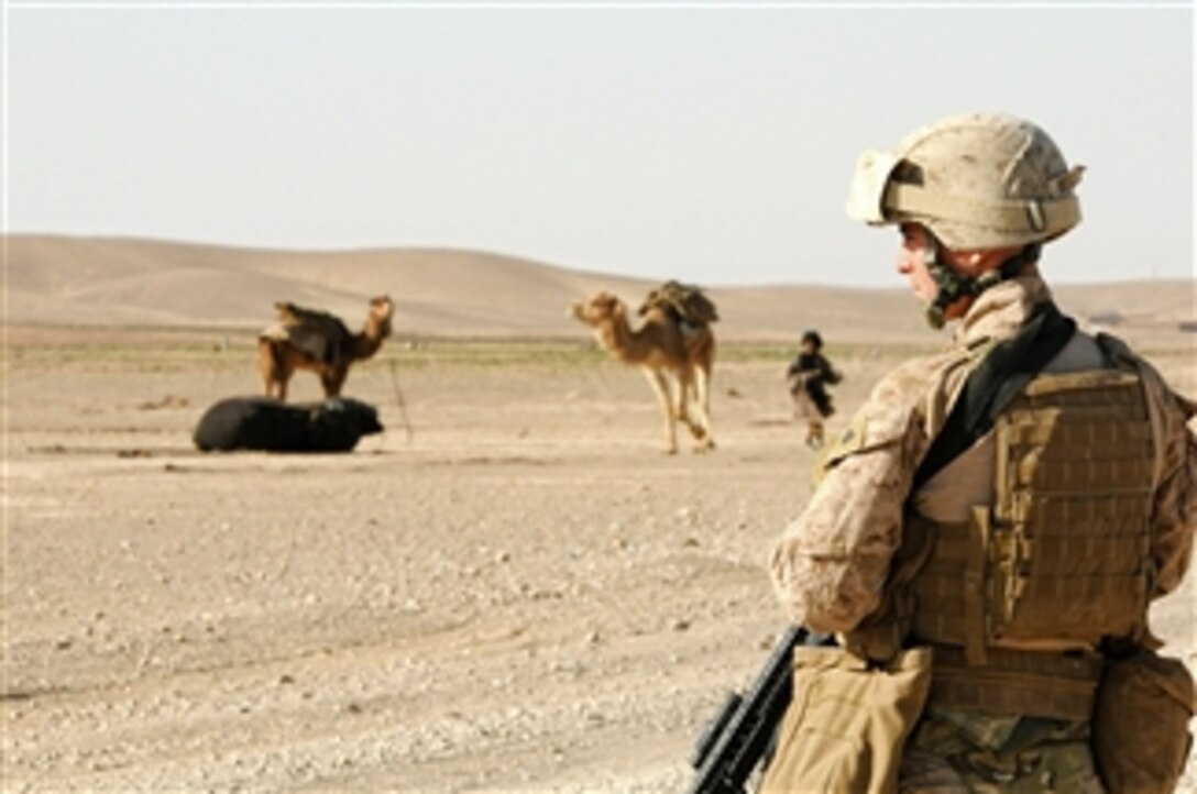 Cpl. Theodore Criswell, with 2nd Battalion, 11th Marines, stands guard at a checkpoint in Helmand province, Afghanistan, on March 10, 2012.  Criswell is assigned as the vehicle commander and fire team leader during the mission conducted in order to talk with local Afghans.  
