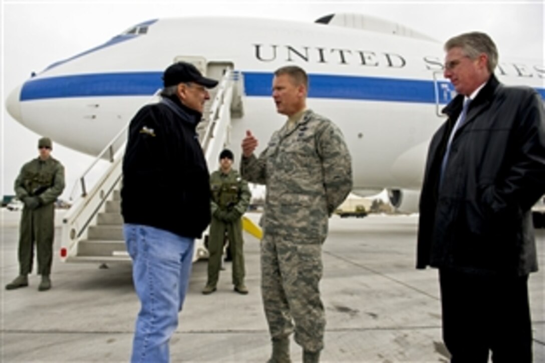 U.S. Defense Secretary Leon E. Panetta speaks with U.S. Air Force Col. James Jacobson and David McCormick, U.S. Embassy acting deputy chief of mission, after arriving on Manas Air Base, Kyrgyzstan, March 13, 2012. Panetta is scheduled to meet with counterparts and troops during his visit in the country. Jacobson is commander, 376th Air Expeditionary Wing.